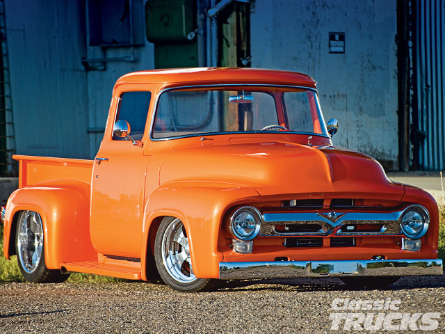 Orange truck gravel road building free wallpaper - medium preview image
