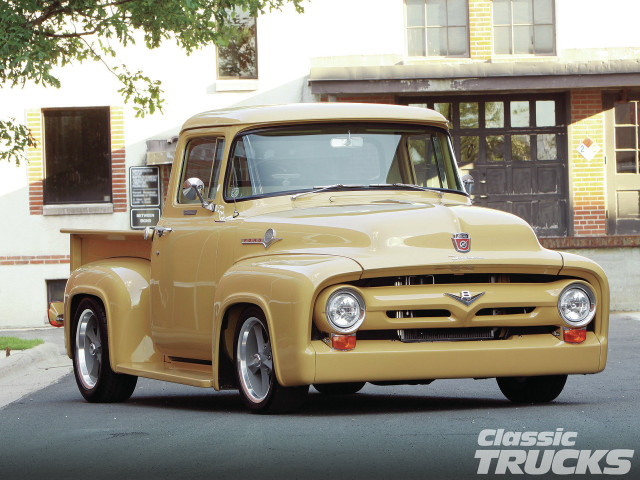 Yellow truck parked road tree free wallpaper - medium preview image