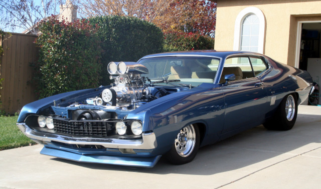 Blue car engine hood driveway free wallpaper - medium preview image