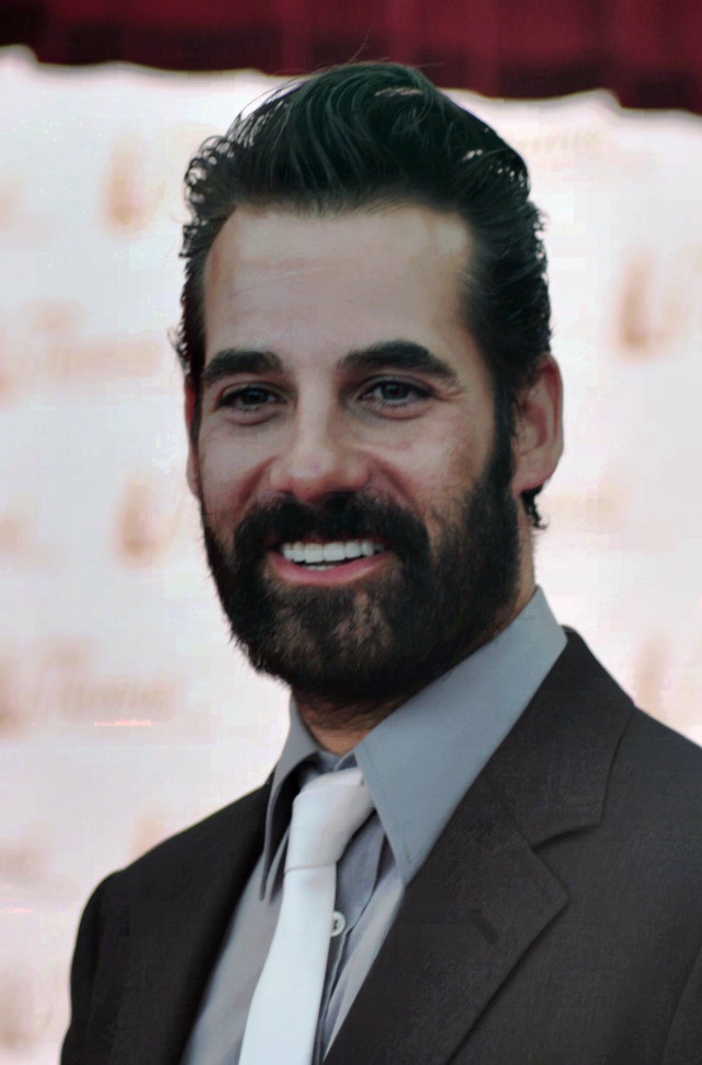 Bearded man in suit smiling free wallpaper - medium preview image