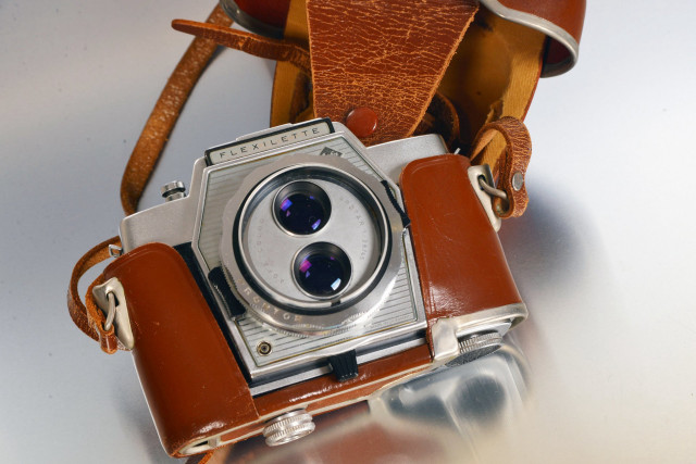 Camera bag table macro grey free wallpaper - medium preview image