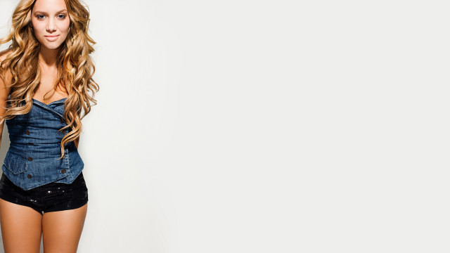 Woman denim outfit posing hair free wallpaper - medium preview image