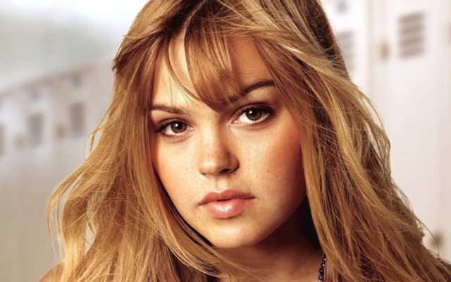 Woman blonde hair necklace serious free wallpaper - medium preview image