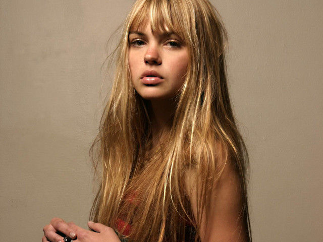 Woman blonde hair cell phone #2 free wallpaper - medium preview image