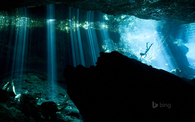 Cave waterfall person swimming sunlight free wallpaper - medium preview image