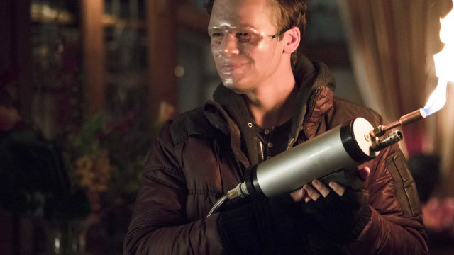 Man holding lighter jacket glasses free wallpaper - medium preview image