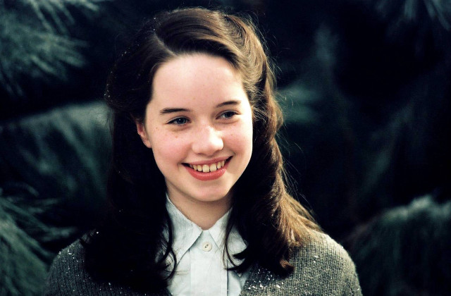 Woman smiling sweater tie tree free wallpaper - medium preview image