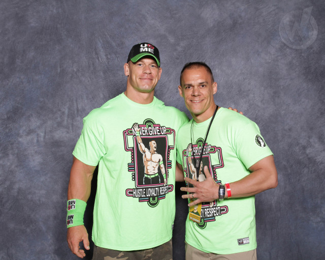 Two men green shirts microphone free wallpaper - medium preview image