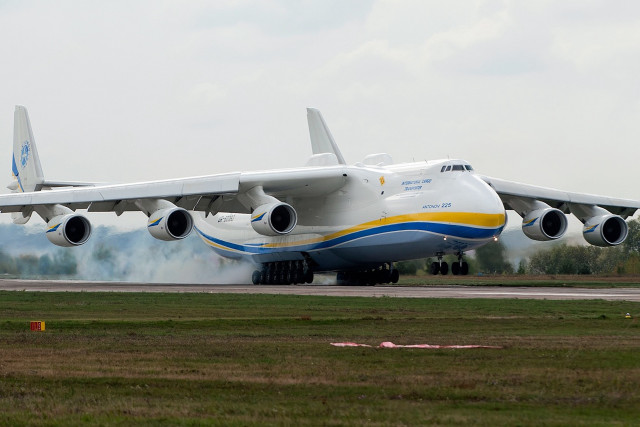 Jetliner takeoff smoke airport sideprofile free wallpaper - medium preview image