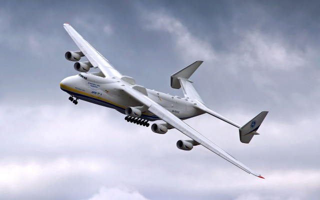 Jetliner flying cloudy sky landing free wallpaper - medium preview image
