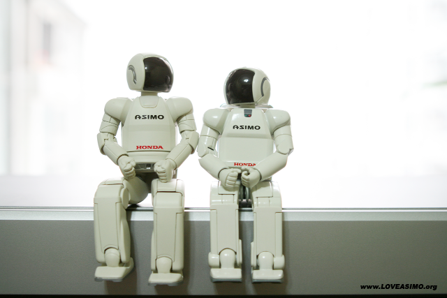 Two robots ledge window building free wallpaper - medium preview image