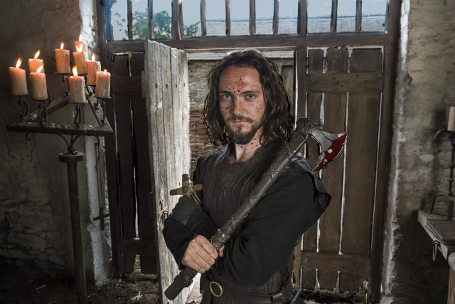 Man holding sword candles door free wallpaper - medium preview image