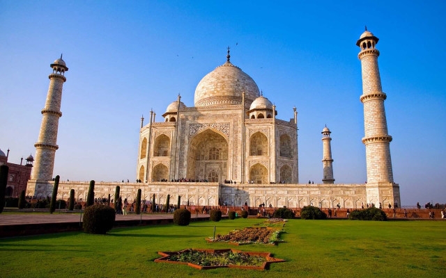 Large white building towers green free wallpaper - medium preview image