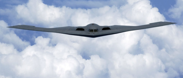 Military plane flying cloudy sky free wallpaper - medium preview image