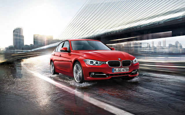 Red car wet road bridge free wallpaper - medium preview image