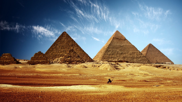 Pyramids desert sky person walking free wallpaper - medium preview image