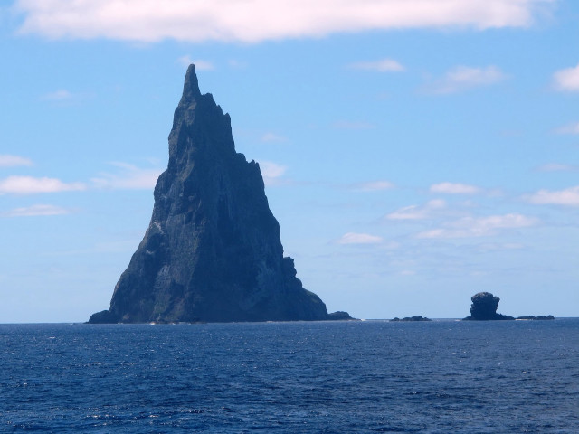 Large rock formation ocean boat #2 free wallpaper - medium preview image