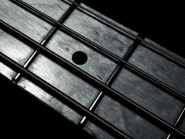 Guitar neck closeup black background #3 free wallpaper - medium preview image