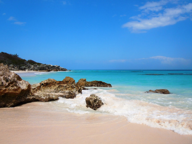 Beach rock formation blue water #3 free wallpaper - medium preview image