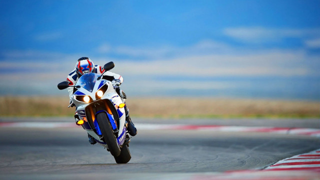 Motorcycle race track sky grass free wallpaper - medium preview image