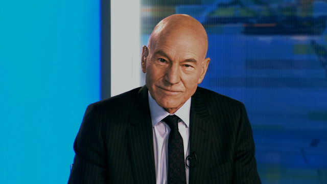 Man suit tie sitting tv free wallpaper - medium preview image