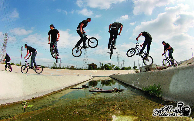 Man bike tricks air pond free wallpaper - medium preview image