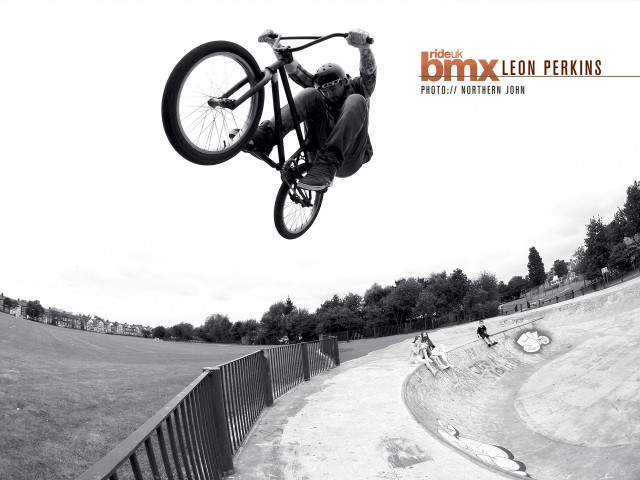 Man flying bike ramp park free wallpaper - medium preview image