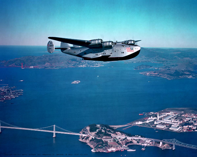 Plane flying water bridge city free wallpaper - medium preview image
