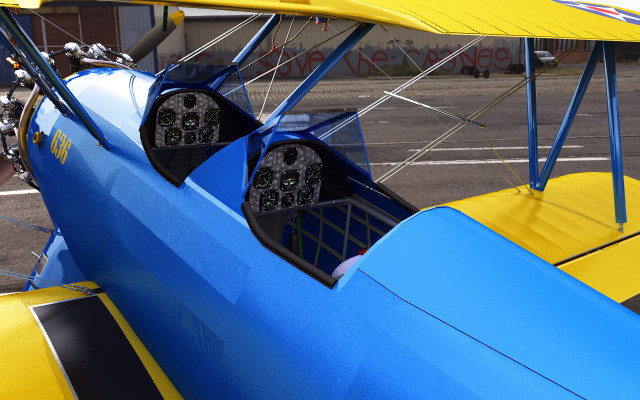 Blue yellow airplane propeller man free wallpaper - medium preview image