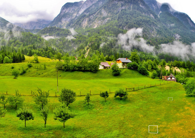Green field house mountains background free wallpaper - medium preview image