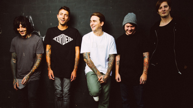 Men tattoos standing wall group free wallpaper - medium preview image