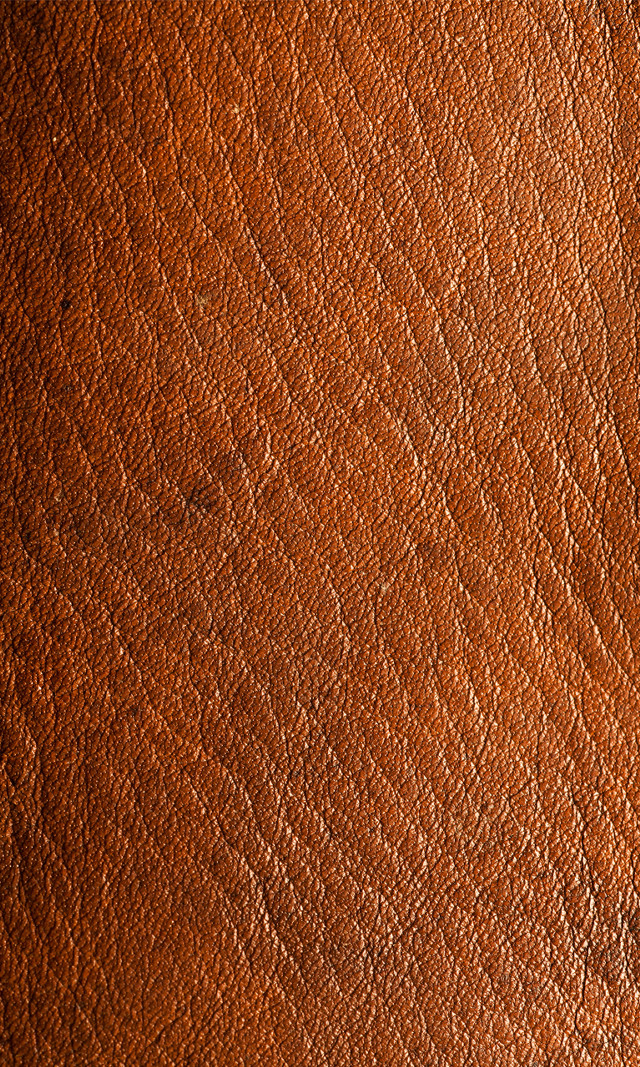 Brown leather textured surface scratches free wallpaper - medium preview image
