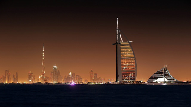 Tall building spire city night free wallpaper - medium preview image
