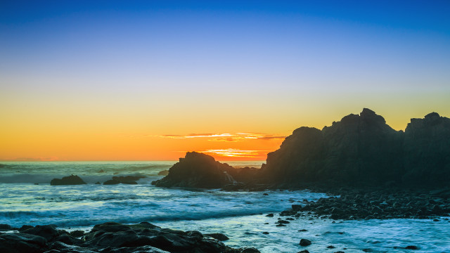 Sunset ocean rocks water foreground free wallpaper - medium preview image