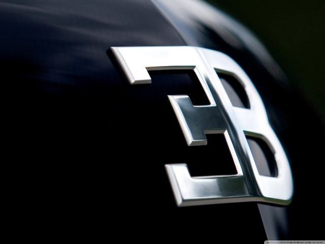 Car emblem closeup vehicle hood free wallpaper - medium preview image