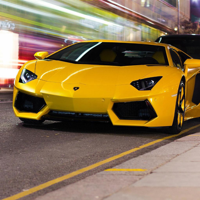 Yellow sports car night bus free wallpaper - medium preview image