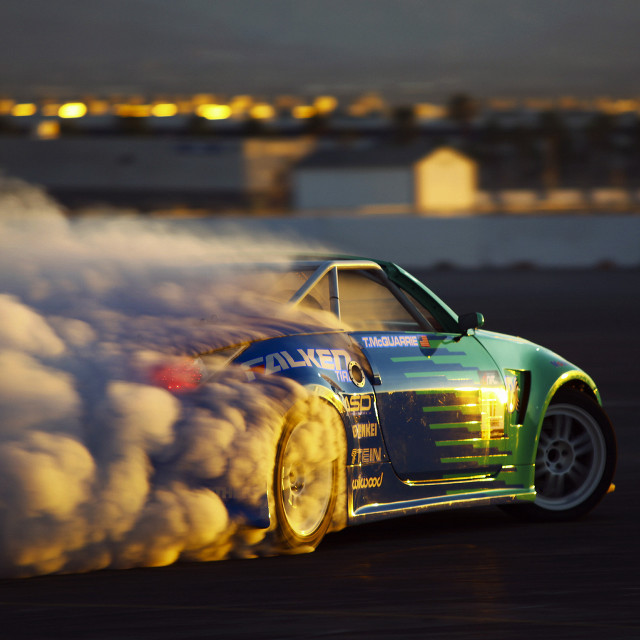 Car smoke tires track nighttime free wallpaper - medium preview image