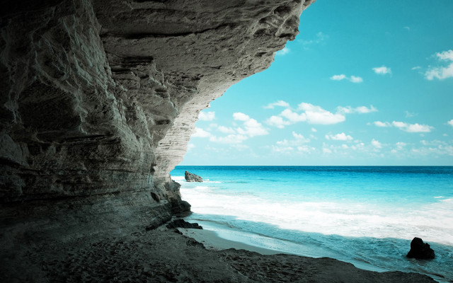 Person sitting rock ocean surfboard free wallpaper - medium preview image