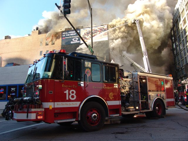 Fire truck driving smoke street free wallpaper - medium preview image