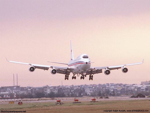 Jetliner cloudy sky city skyline #2 free wallpaper - medium preview image