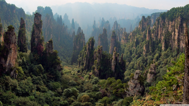 Mountain landscape tall rocks trees free wallpaper - medium preview image