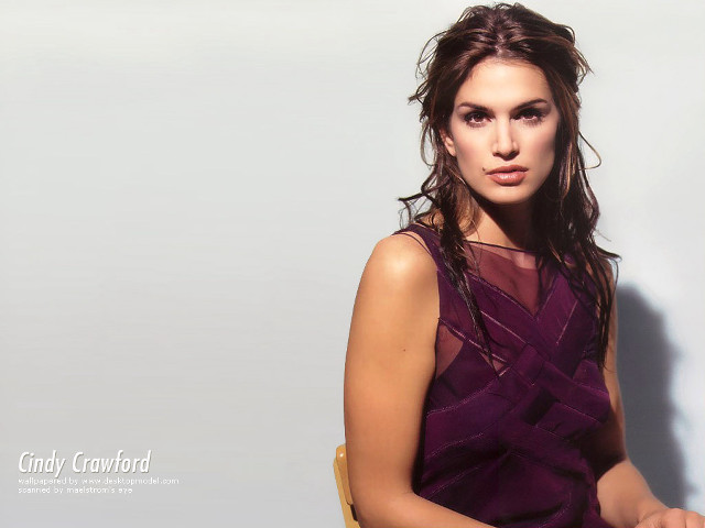 Woman sitting chair arms crossed free wallpaper - medium preview image
