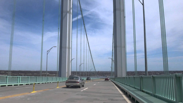 Car driving bridge sunny day free wallpaper - medium preview image