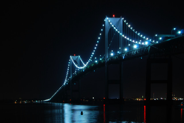 Illuminated bridge night water reflection free wallpaper - medium preview image