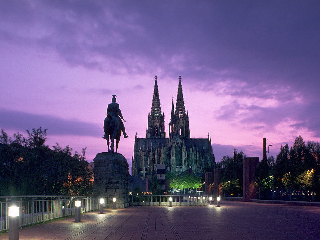 Statue man horse cathedral night free wallpaper - medium preview image
