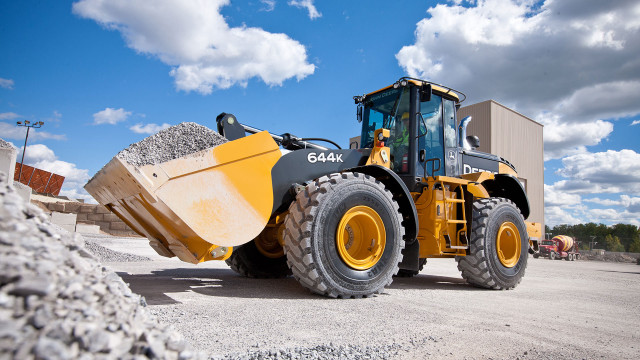 Large yellow tractor gravel building free wallpaper - medium preview image