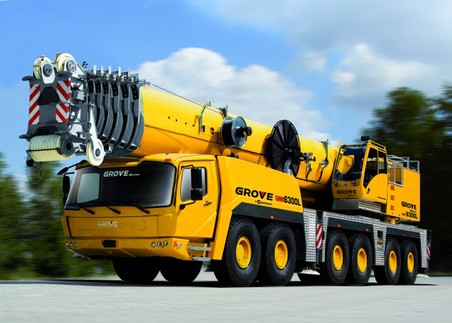 Yellow crane parked road trees free wallpaper - medium preview image
