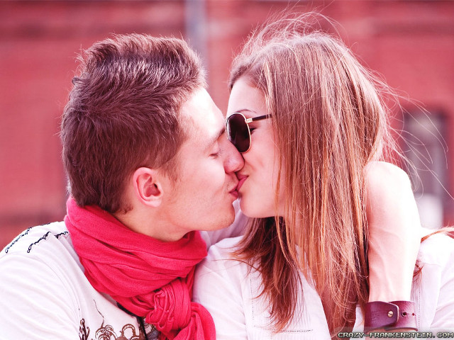 Man woman kissing sun red free wallpaper - medium preview image