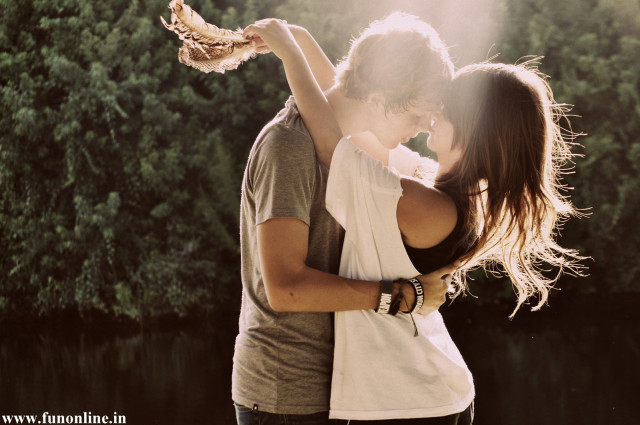 Man woman embracing lake trees free wallpaper - medium preview image