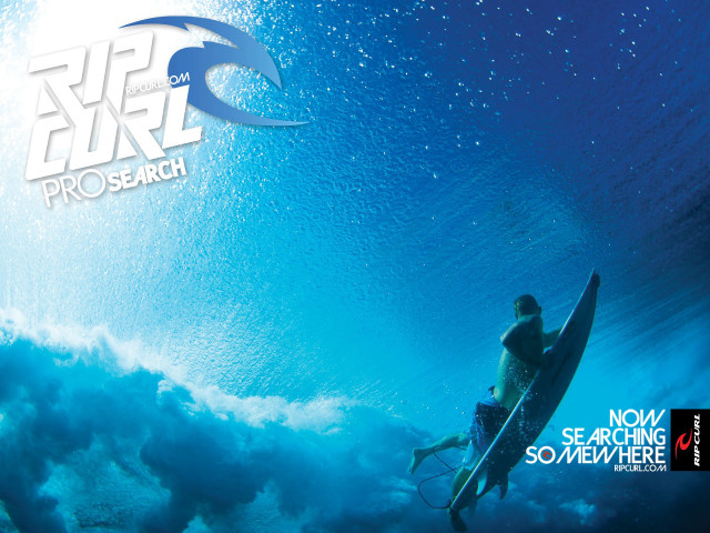 Man riding surfboard under wave free wallpaper - medium preview image
